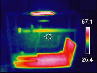 Table with red colour areas with higher temperature about 67 degree and remaining part colder with 26 degree celsius